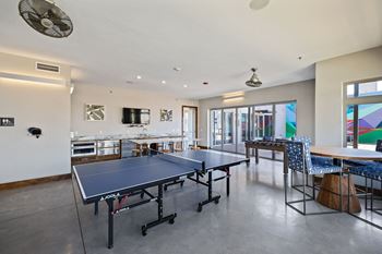 HDTV lounge with billiards table and shuffle board